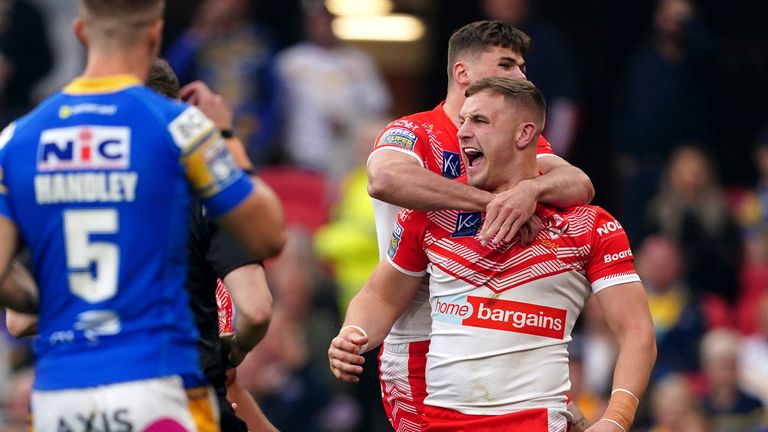 St Helens v Leeds Rhinos - Betfred Super League - Grand Final - Old Trafford
St Helens&#39; Matty Lees (right) celebrates scoring their side&#39;s first try during the Betfred Super League Grand Final at Old Trafford, Manchester. Picture date: Saturday September 24, 2022.