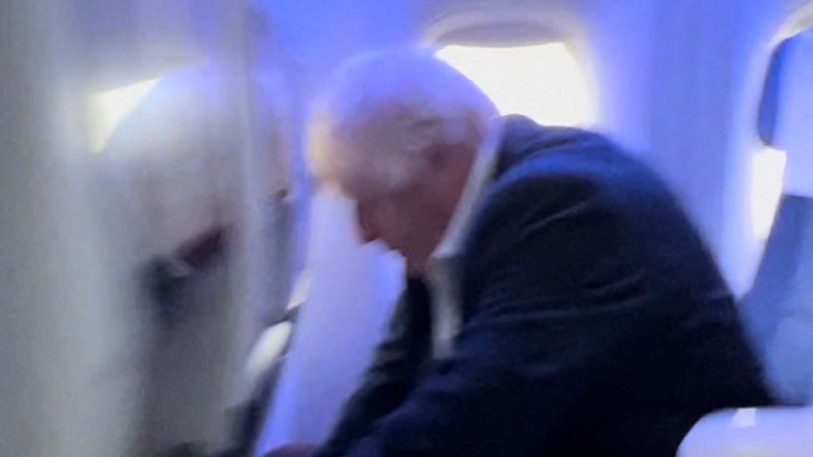 Boris Johnson sits in economy for flight back to UK - after telling an ally he will run to be PM again