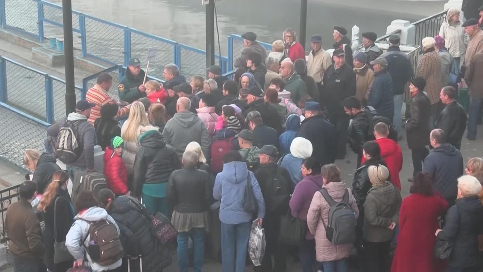 ukraine-war-kherson-residents-line-up-at-ferry-terminal-amid-evacuation-calls