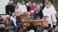The coffins of Robert Garwe and his daughter Shauna