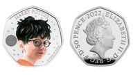 photo issued by The Royal Mint showing both side of an official 50 pence coin featuring Harry Potter to celebrate 25 years since the novel Harry Potter and the Philosopher’s Stone by J.K. Rowling was first published in the UK in 1997 by Bloomsbury Publishing. The first two coins in the collection will feature the portrait of the late Queen Elizabeth II, and the final two coins in the series will feature the official portrait of King Charles III. Issue date: Thursday October 20, 2022.