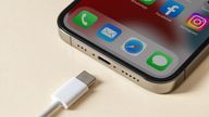 Antalya, TURKEY - June 10, 2022. Apple Iphone 13 Pro and Usb-c or Type-C Wired Charger. EU is forcing all devices to use Usb-c or Type-C