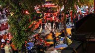 Rescue team and firefighters work on the scene where dozens of people were injured in a stampede during Halloween festival in Seoul, South Korea, October 30, 2022.