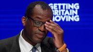 British Chancellor of the Exchequer Kwasi Kwarteng adjusts his glasses during Britain&#39;s Conservative Party&#39;s annual conference in Birmingham, Britain, October 3, 2022. REUTERS/Toby Melville
