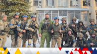 Ukrainian troops pose for a photo in Lyman, Ukraine