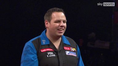 Lewis hits historic 9-darter in Worlds final