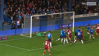 Peterborough keeper's bizarre double save while lying on his back!