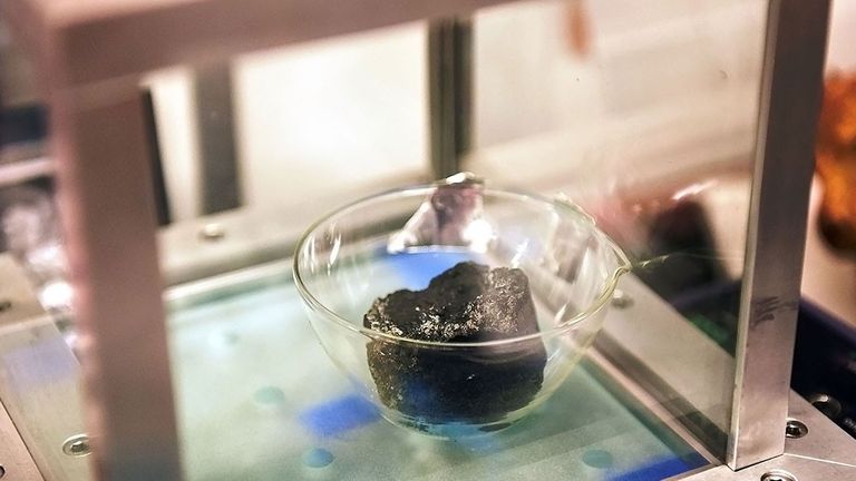 Ancient meteorites like Ivuna could have brought the very first water and organic matter to Earth by smashing into the young planet billions of years ago  Photo: Natural History Museum