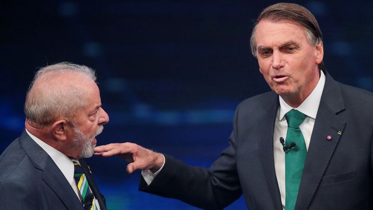 Former Brazilian President and presidential candidate Luiz Inacio Lula da Silva and Brazilian President and re-elected candidate Jair Bolsonaro speak during the Presidential Debate before foreign elections, in Sao Paulo, Brazil, on October 16, 2022. REUTERS / Mariana Greif