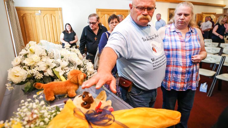 Before his discovery, a memorial service was held in Cairo, Indiana, in June.Image: Associated Press