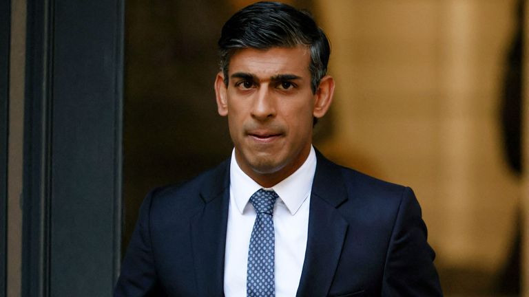 New leader of Britain&#39;s Conservative Party Rishi Sunak walks outside the party&#39;s headquarters in London, Britain, October 24, 2022. REUTERS/Henry Nicholls