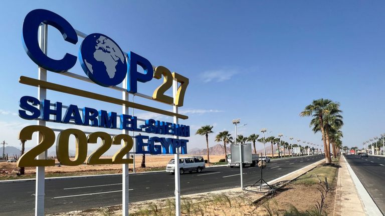 A COP27 sign on the road leading to the conference area in Egypt's Red Sea resort of Sharm el-Sheikh