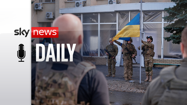 Ukraine soldiers raise Ukrainian flag