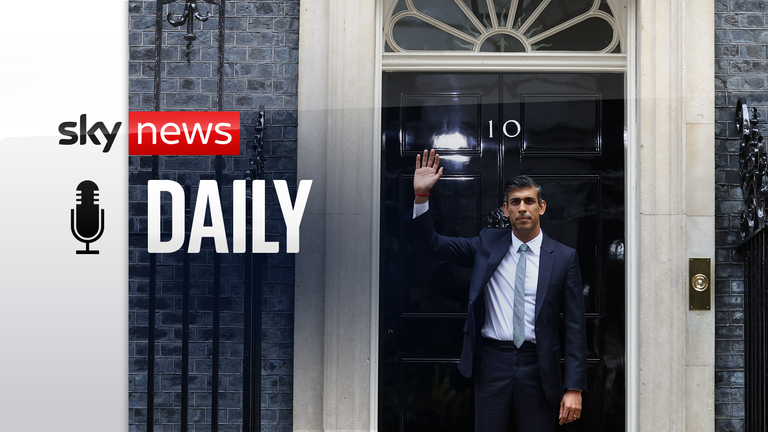 Britain&#39;s new Prime Minister Rishi Sunak waves in front of Number 10 Downing Street.