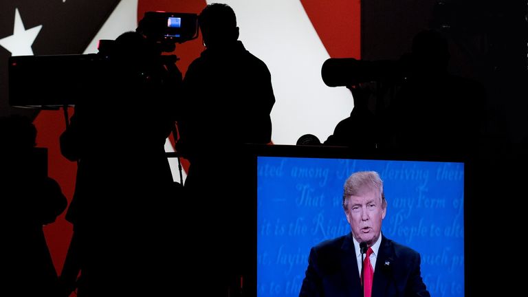 UNITED STATES - OCTOBER 19: Republican candidate Donald Trump is seen on a television monitor inside the debate hall during the final debate with Democrat candidate Hillary Clinton at UNLV in Las Vegas on Oct. 19, 2016. (Photo By Bill Clark/CQ Roll Call) (CQ Roll Call via AP Images)