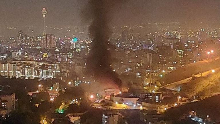 Smoke seen pouring out of the prison, in capital Tehran Pic: Twitter/IanBremner 