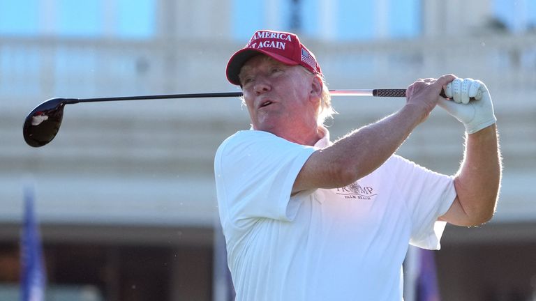 Oct 27, 2022; Miami, Florida, USA; Former President Donald Trump hits off of the first tee during the Pro-Am tournament before the LIV Golf series at Trump National Doral. Mandatory Credit: Jasen Vinlove-USA TODAY Sports
