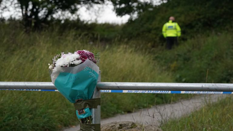 A floral tribute left at the scene on Aycliffe Crescent, Gateshead, where a 14-year-old boy was fatally attacked. Picture date: Tuesday October 4, 2022.
