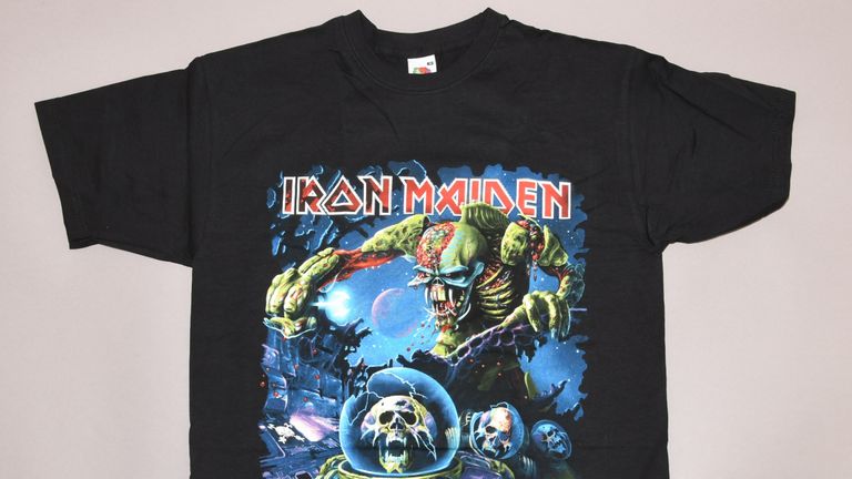 Pic: Police Scotland of the front (left) and back of an Iron Maiden T-Shirt, similar to the one worn by a man in 2015 

