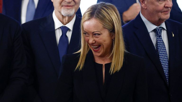 Italy&#39;s new prime minister Giorgia Meloni grins during the swearing-in ceremony in Rome  
