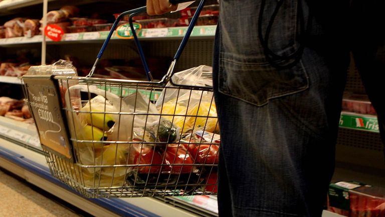 Undated file photo of a man holding a shopping basket in a supermarket. Shoppers have witnessed an 11.6% surge in grocery prices for the past month, the highest level since 2008, according to new figures. Research firm Kantar has said this equates to a £533 annual increase in the average household&#39;s grocery bill. Issue date: Tuesday August 16, 2022