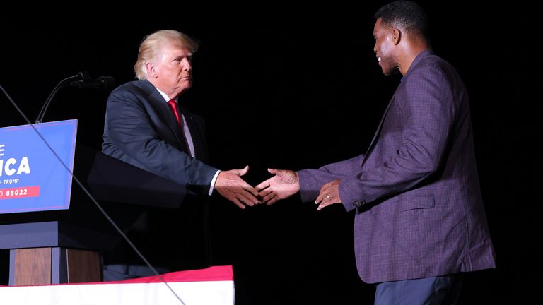 Herschel Walker and Donald Trump during a demonstration in Georgia in 2021