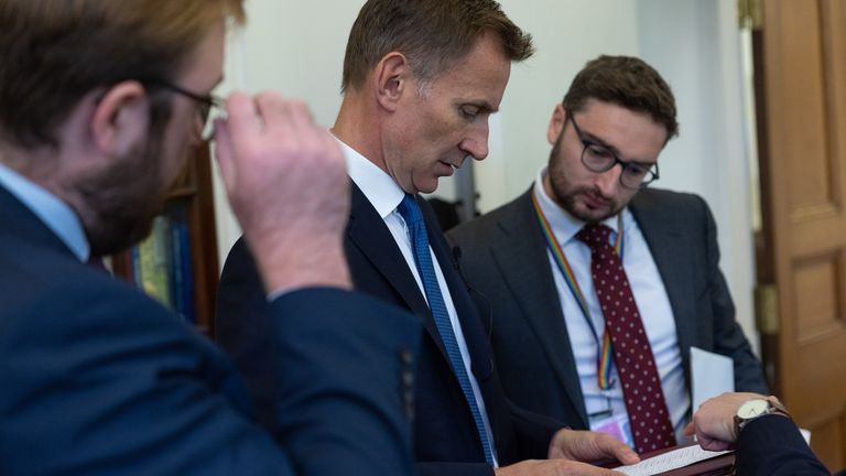 The Chancellor Jeremy Hunt in discussion with Treasury officials before he makes a statement from HM Treasury
Credit: HM Treasury
