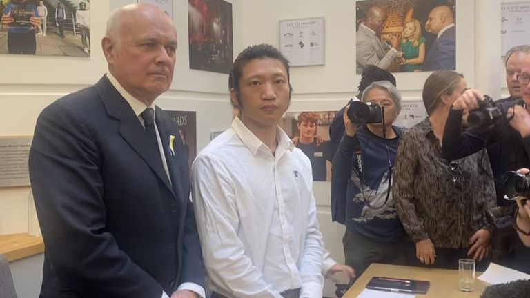 Bob Chan with senior Tory MP Iain Duncan Smith, who has called for the government to expel the diplomats involved in the attack