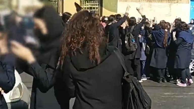 Footage shared online is often blurred or shows the back of people's heads, like in this screenshot of a video of protesting school girls