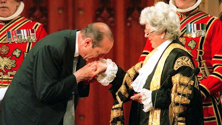 French President Jacques Chirac kisses the hand of Speaker of the House of Commons Betty Boothroyd, after Chirac addresses both houses of parliament at the Palace of Westminster on May 15. President Chirac is on a four-day visit to Britain.