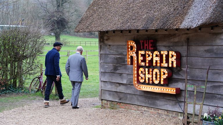 EMBARGOED UNTIL 00:01 WEDNESDAY 26 OCTOBER FOR EDITORIAL USE ONLY King Charles III, then Prince of Wales, with Jay Blade (left) during a special episode of The Repair Shop as part of the BBC's centenary celebrations.  Release date: Wednesday, October 26, 2022.