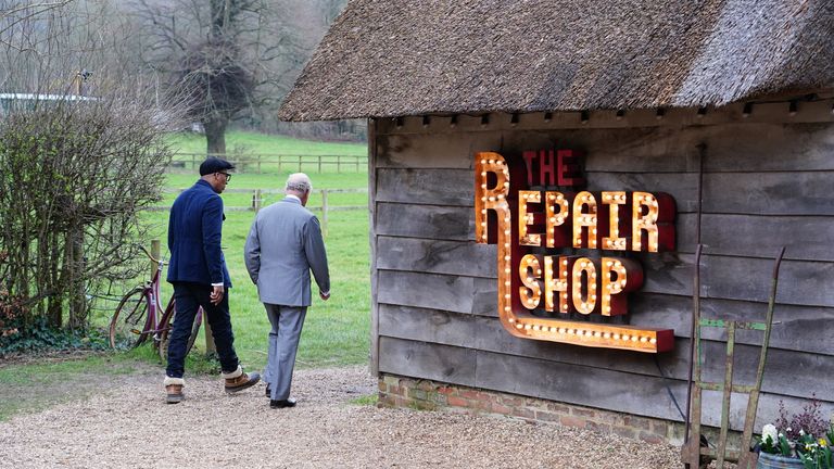 EMBARGOED TO 0001 WEDNESDAY OCTOBER 26 EDITORIAL USE ONLY King Charles III, then Prince of Wales with Jay Blades (left) during a special episode of The Repair Shop as part of the BBC&#39;s centenary celebrations. Issue date: Wednesday October 26, 2022.