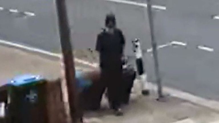 Jemma Mitchell on Chaplin Road, north west London dragging a blue suitcase and another smaller bag on 11 June 2021. Pic: Screen grab taken from CCTV issued by Metropolitan Police