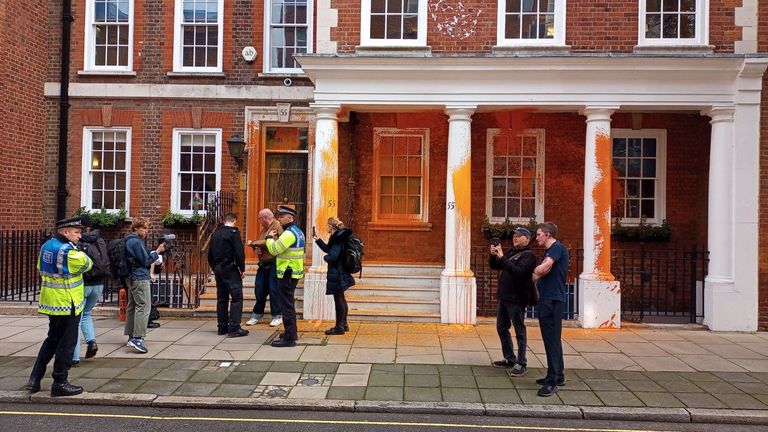 Just Stop Oil sprays fossil fuel lobby HQ with orange paint. Pic: Just Stop Oil