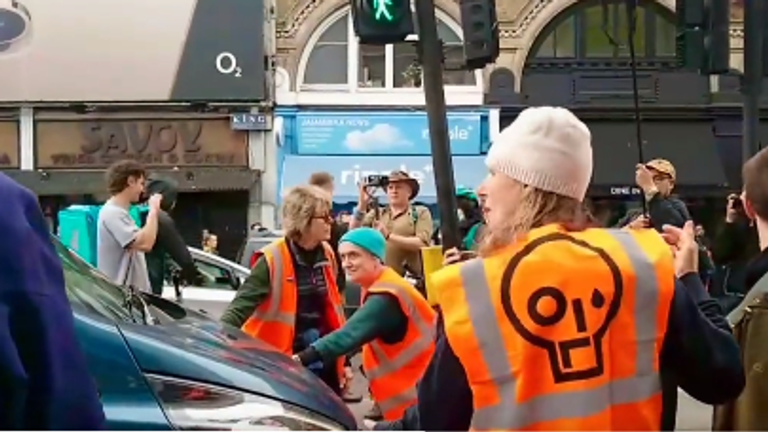 Just Stop Oil protesters clash with public after blocking road in London as 26 arrested | UK News