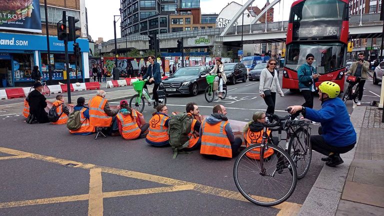 Handout photo issued by Just Stop Oil of protesters blocking Shoreditch High Street in London.  Picture date: Saturday October 15, 2022.