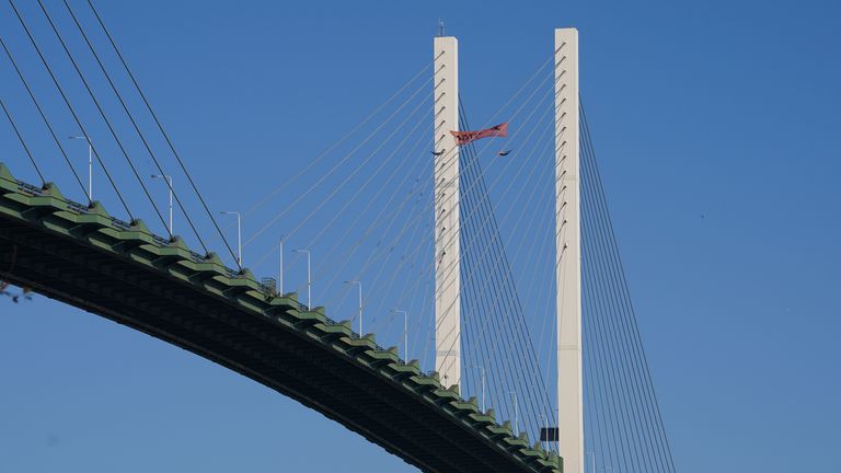 Just Stop Oil protesters continue their protest for a second day on the Queen Elizabeth II Bridge, which links Kent and Essex and which remains closed for traffic, after it was scaled by two climbers from the group. Picture date: Tuesday October 18, 2022.
