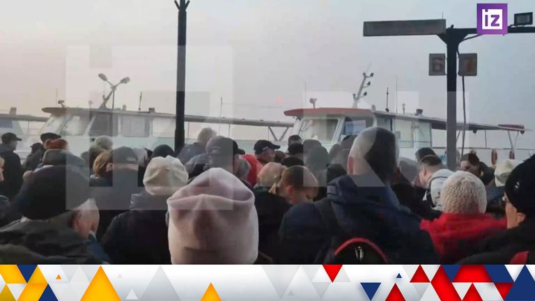Kherson residents at ferry terminal