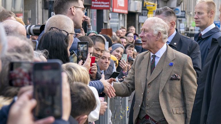 King Charles III meets the crowds on Union Street during a visit to Aberdeen Town House to meet families who have settled in Aberdeen from Afghanistan, Syria and Ukraine. Picture date: Monday October 17, 2022.