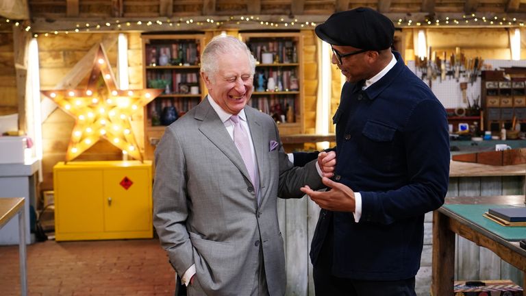 EMBARGOED TO 0001 WEDNESDAY OCTOBER 26 EDITORIAL USE ONLY King Charles III, then Prince of Wales with Jay Blades (right) during a special episode of The Repair Shop as part of the BBC&#39;s centenary celebrations. Issue date: Wednesday October 26, 2022.
