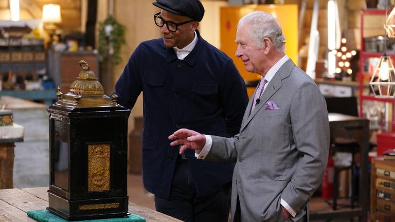 EMBARGOED TO 0001 WEDNESDAY OCTOBER 26 EDITORIAL USE ONLY King Charles III, then Prince of Wales with Jay Blades (left) during a special episode of The Repair Shop as part of the BBC&#39;s centenary celebrations. Issue date: Wednesday October 26, 2022.