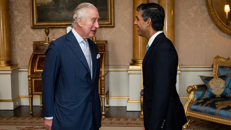 King Charles III welcomes Rishi Sunak during an audience at Buckingham Palace, London, where he invited the newly elected leader of the Conservative Party to become Prime Minister and form a new government. Picture date: Tuesday October 25, 2022.
