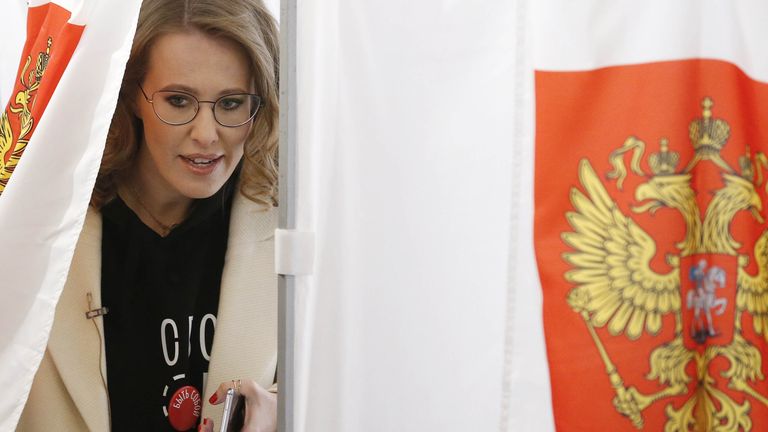 Presidential candidate Ksenia Sobchak walks out of a voting booth at a polling station during the presidential election in Moscow, Russia March 18, 2018. REUTERS/Maxim Shemetov