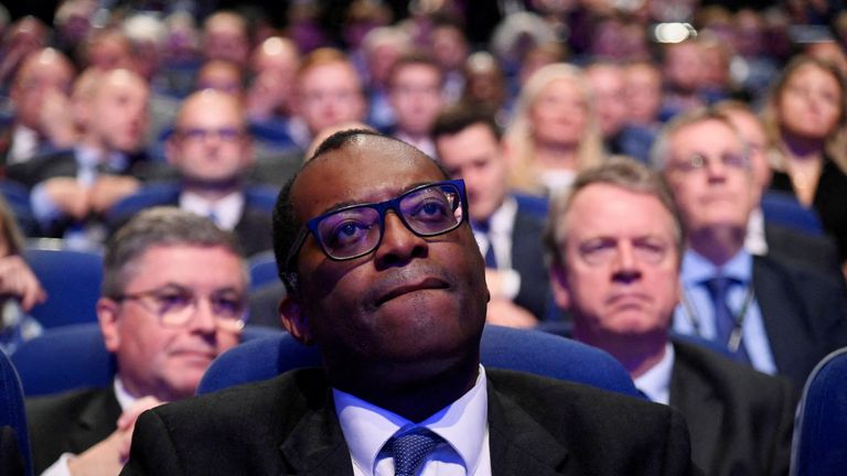 Chancellor of the Exchequer Kwasi Kwarteng listens to British Prime Minister Liz Truss give a speech, during Britain&#39;s Conservative Party&#39;s annual conference in Birmingham, Britain, October 5, 2022. REUTERS/Toby Melville .
