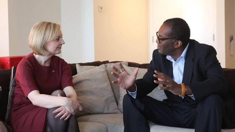 Prime Minister Liz Truss talks with Chancellor of the Exchequer, Kwasi Kwarteng on his arrival at the Conservative Party Conference in Birmingham