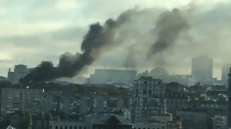 Smoke rises from buildings in Kyiv after sound of incoming missiles