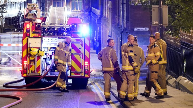 Firefighters at the scene of a fire in Leeds city centre which broke out on the top floors of a derelict building in Cookridge Street, near the city&#39;s Millennium Square Picture date: Saturday October 15, 2022.