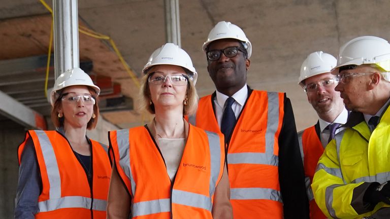 Prime Minister Liz Truss (second left) and Chancellor of the Exchequer Kwasi Kwarteng (centre) during a visit to a construction site for a medical innovation campus in Birmingham, on day three of the Conservative Party annual conference at the International Convention Centre in Birmingham. Picture date: Tuesday October 4, 2022.
