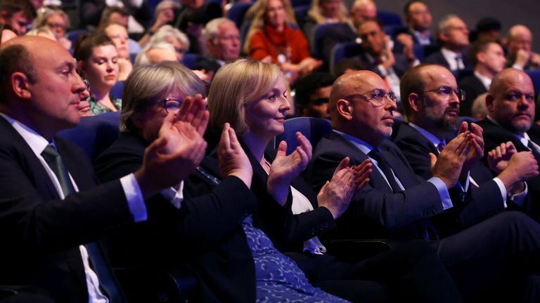 British Prime Minister Liz Truss, Chancellor of the Duchy of Lancaster Nadhim Zahawi and Secretary of State for Health and Social Care Therese Coffey attend Britain&#39;s Conservative Party&#39;s annual conference in Birmingham, Britain, October 3, 2022. REUTERS/Hannah McKay