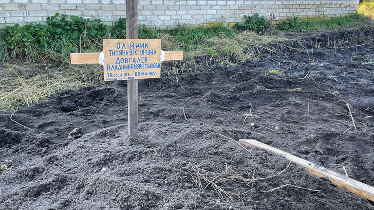 The grave of two civilians in Lyman 